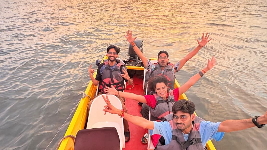 Happy riders on a speed boat at Punnamada Lake, Alleppey Kerala